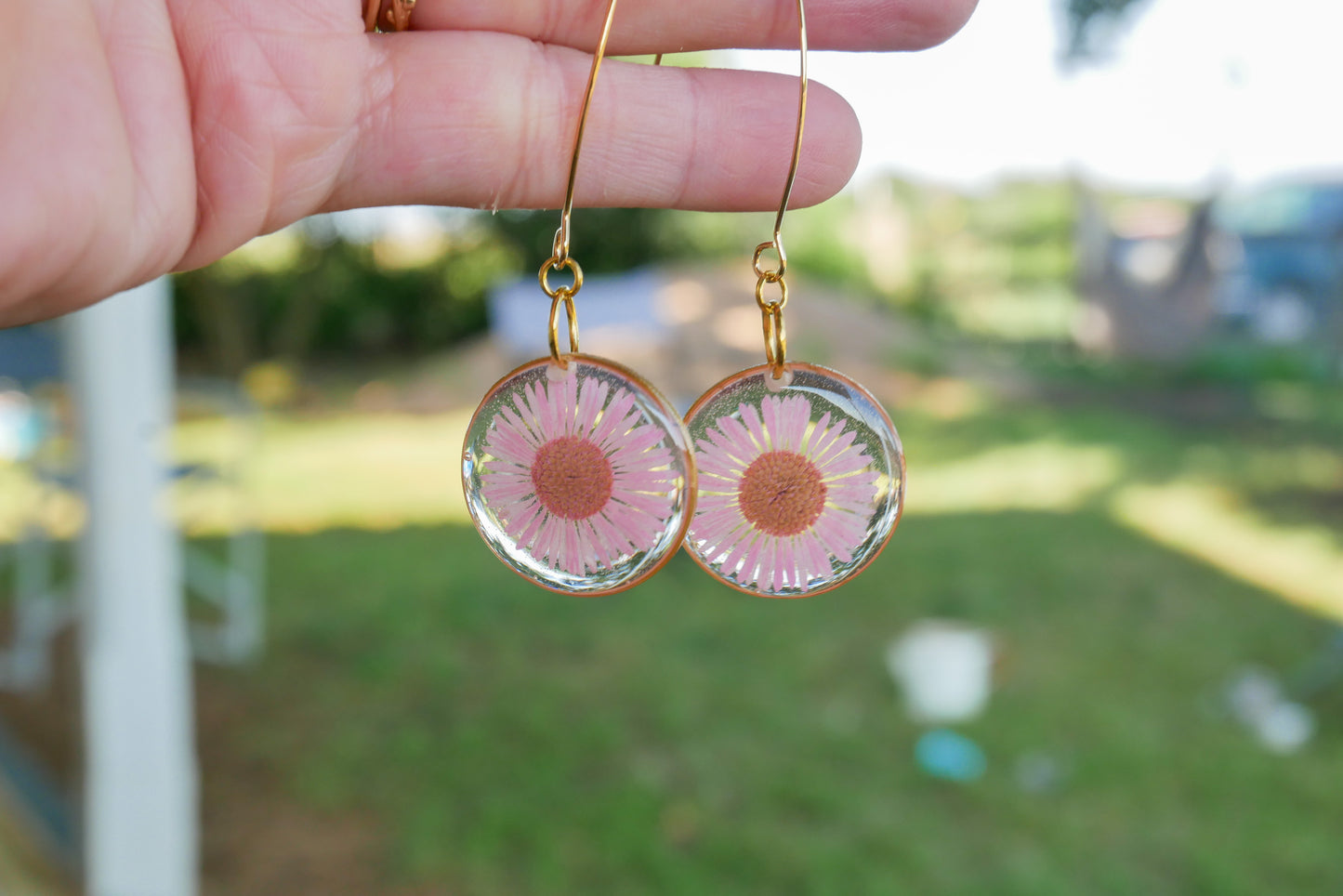Long pink daisy earrings