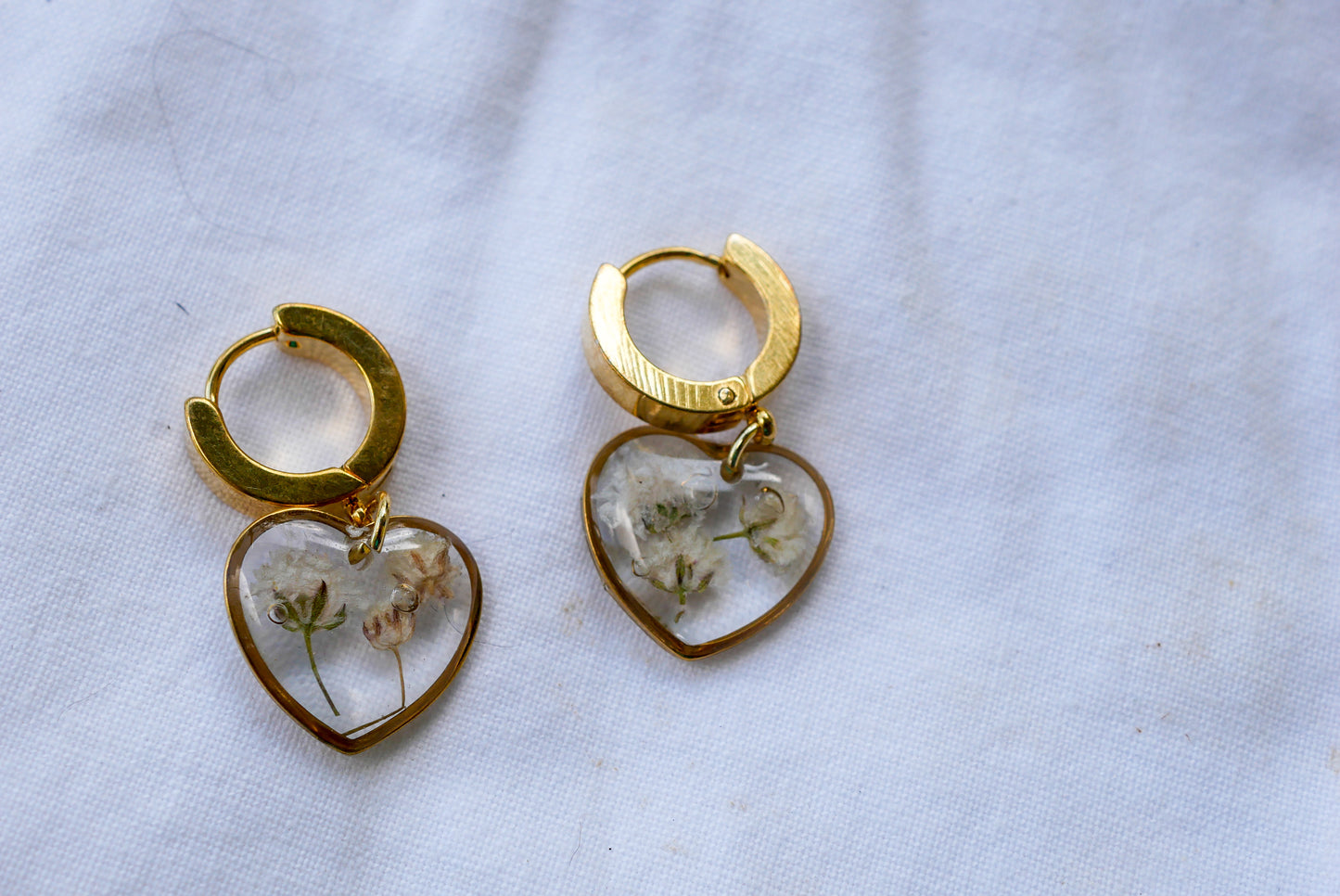 Chunky Huggie Hoops with Pressed Baby’s Breath Heart Charms