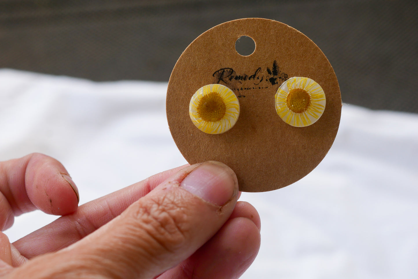 Pressed yellow daisy studs