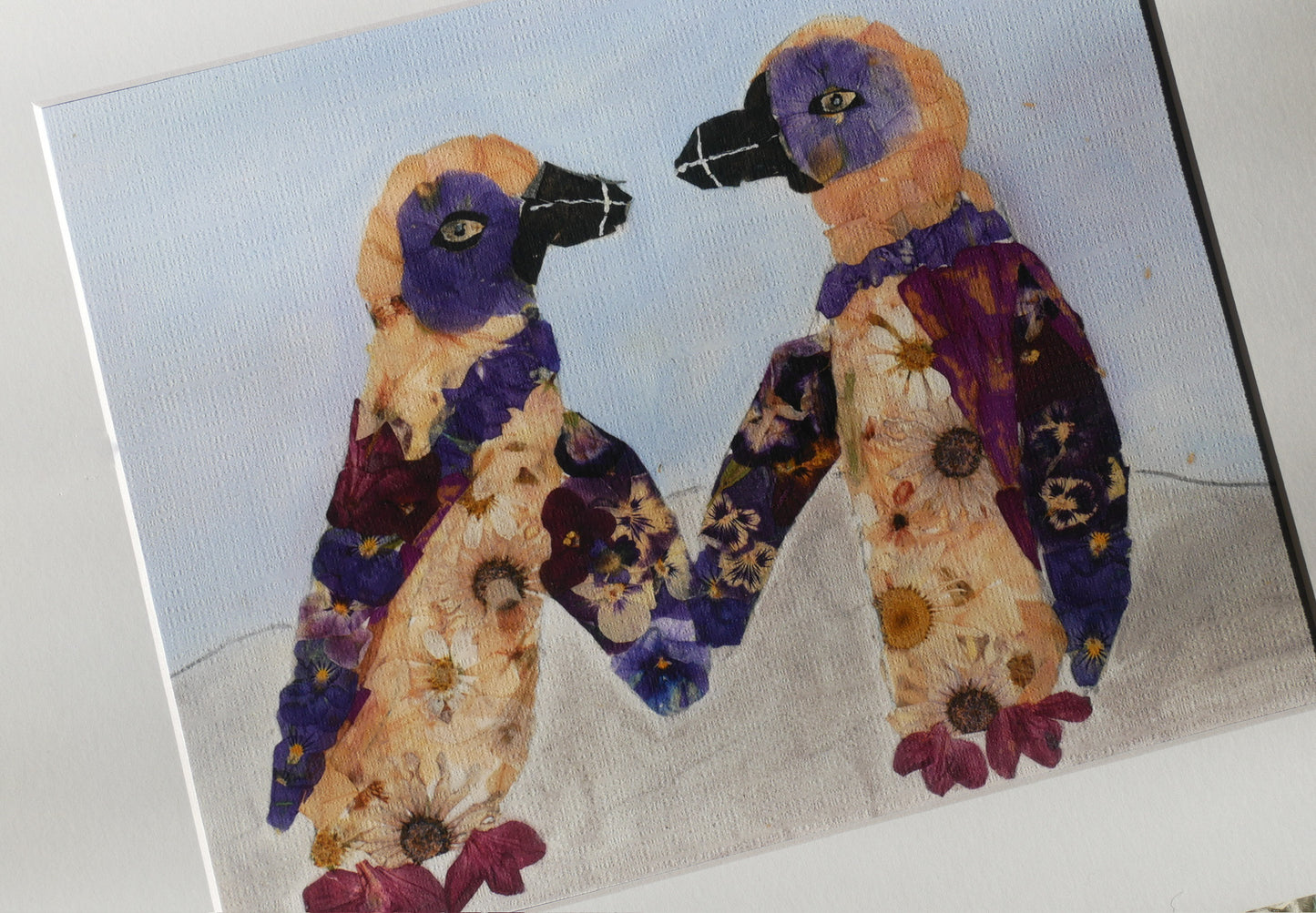 The image is a painting featuring two colorful birds with flower-like patterns on their bodies, standing close together against a blue background.