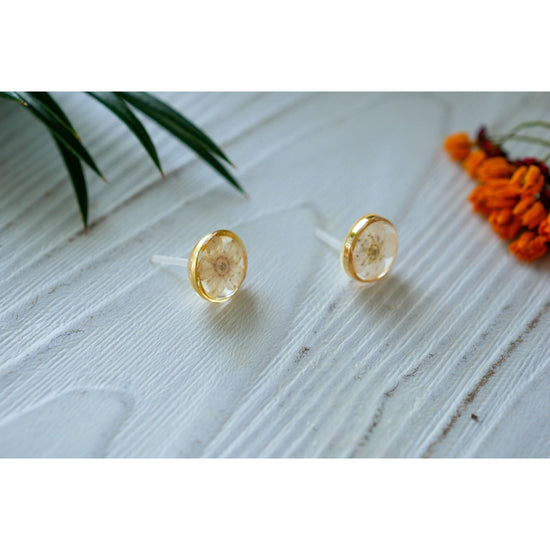 Tiny white flower studs