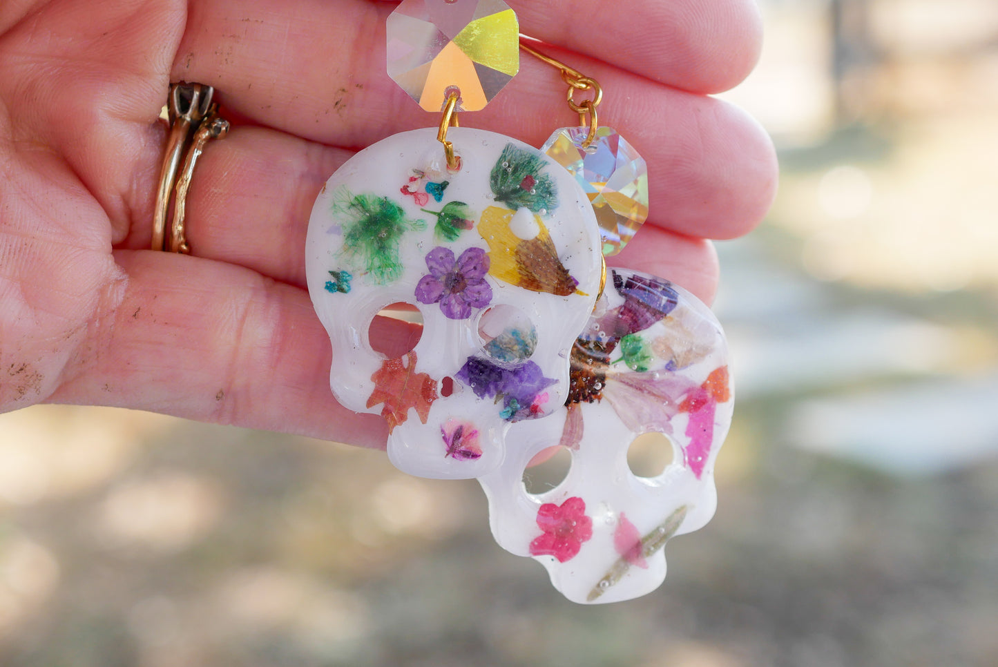 Pressed flower skull earrings for Halloween or dia de Los muertos