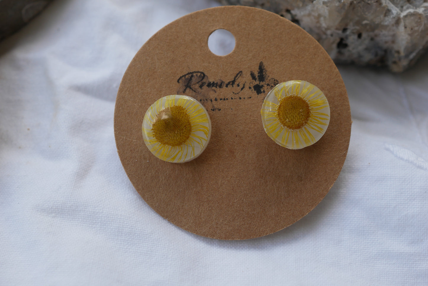 Pressed yellow daisy studs