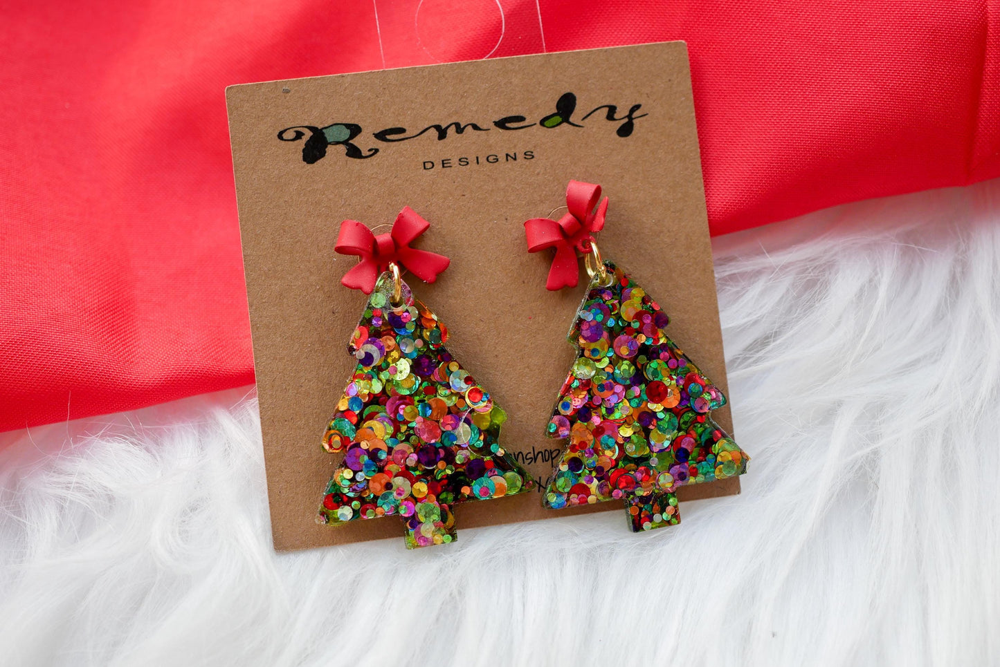 Glittery christmas tree earrings; sequin holiday earrings with a bow