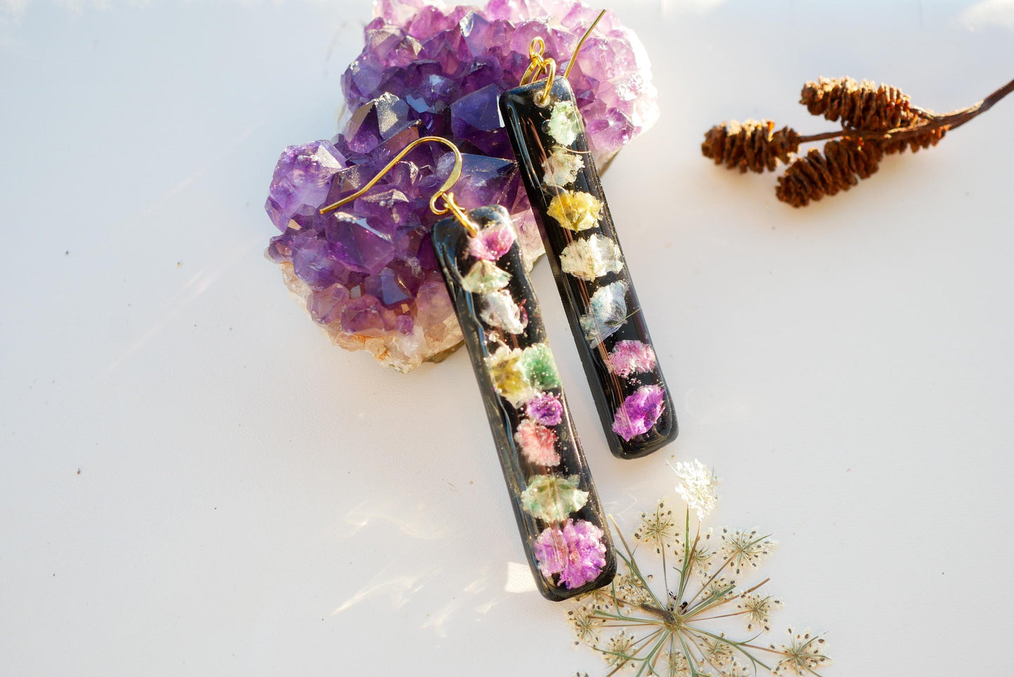 Statement pressed flower rainbow black vertical bar earrings