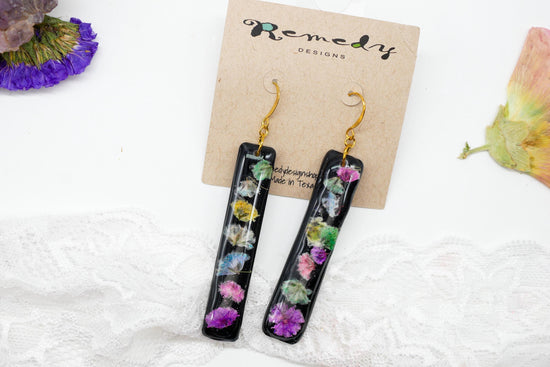 Statement pressed flower rainbow black vertical bar earrings