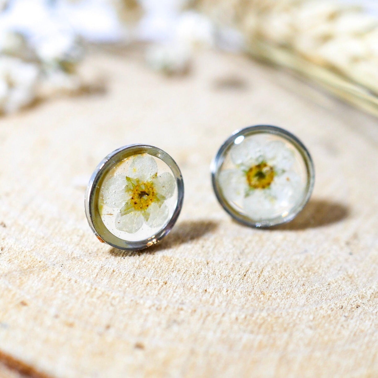 Tiny white flower studs