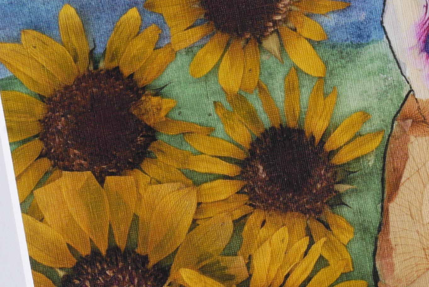 a close-up view of vibrant yellow sunflowers with brown centers, set against a green background.