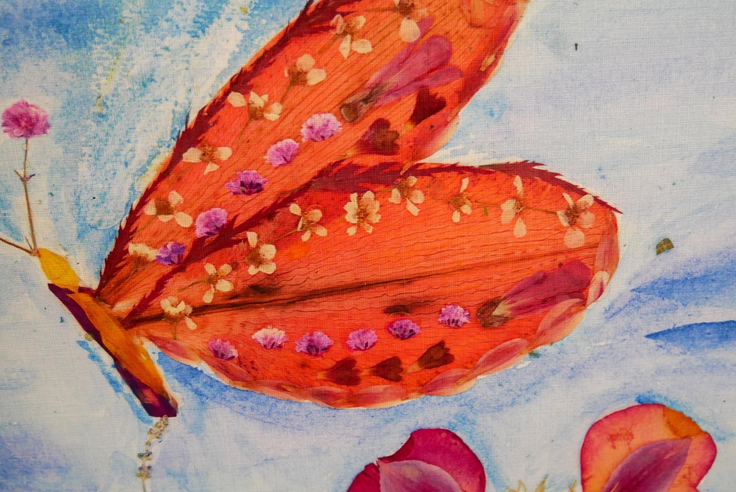 The image is a vibrant painting of a butterfly with its wings spread wide, showcasing a beautiful pattern of orange and purple flowers.