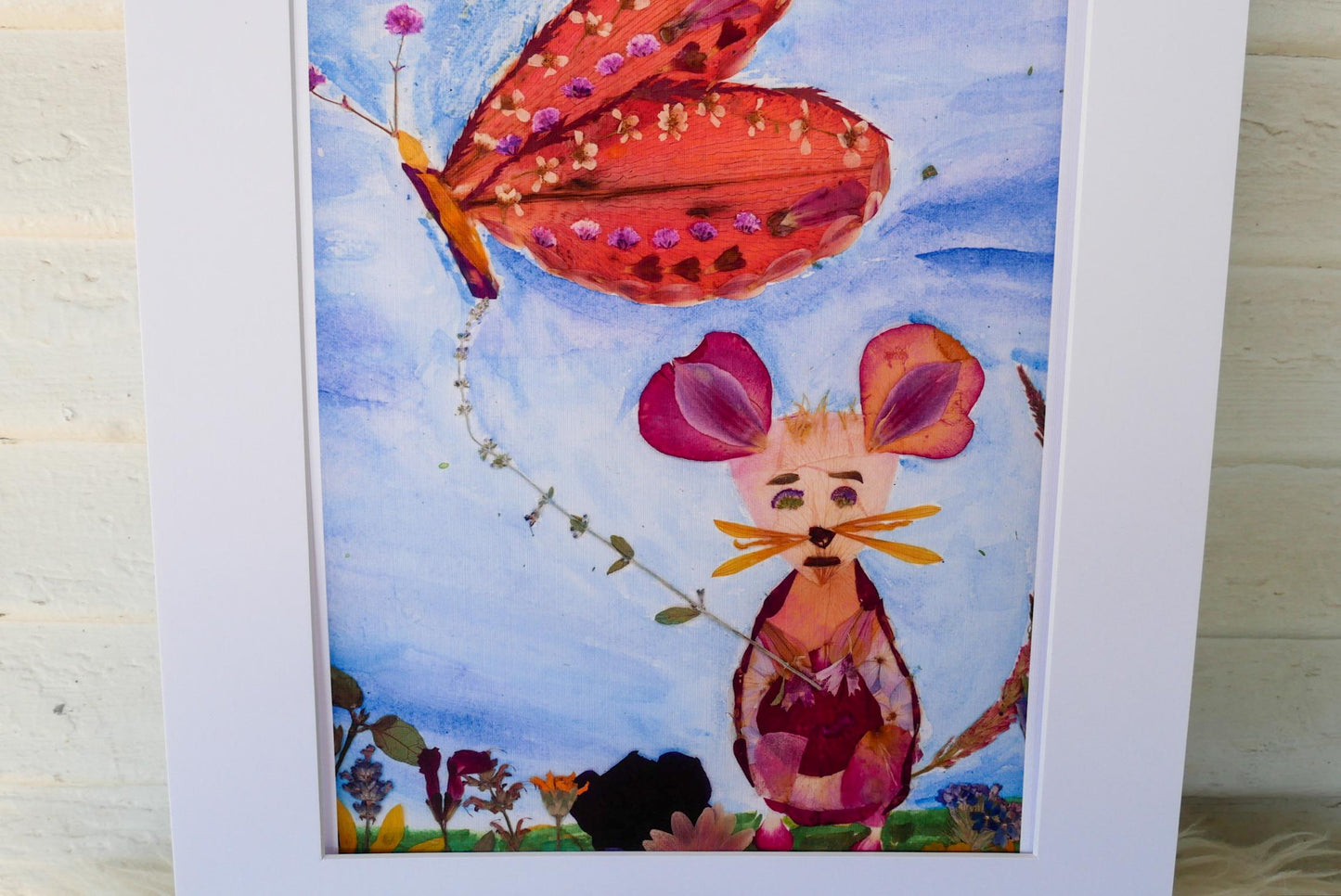 The image is a colorful painting featuring a butterfly and a mouse against a blue sky background.