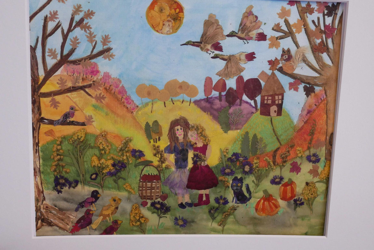 The image is a vibrant and colorful painting depicting a lively autumn scene with various elements such as birds, flowers, and people.