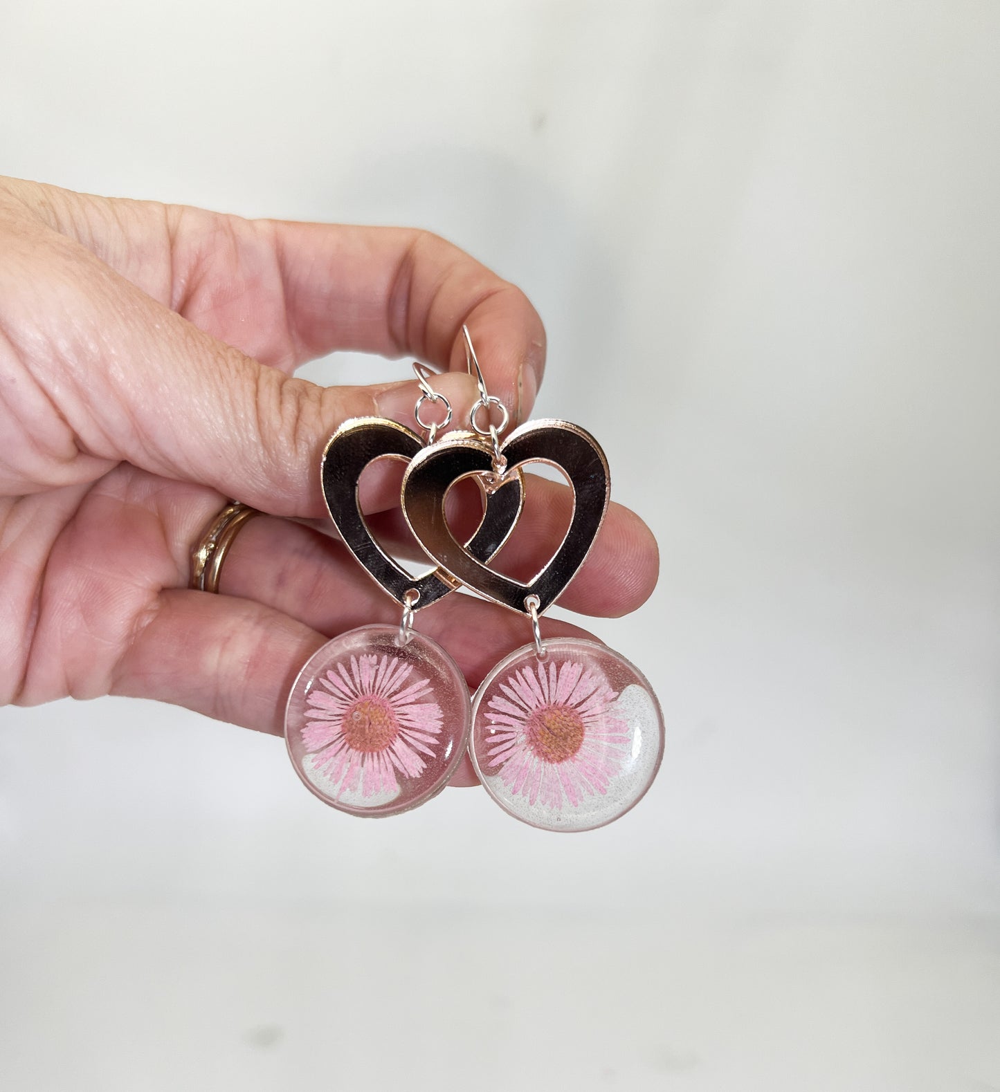 Pink daisy acrylic heart earrings
