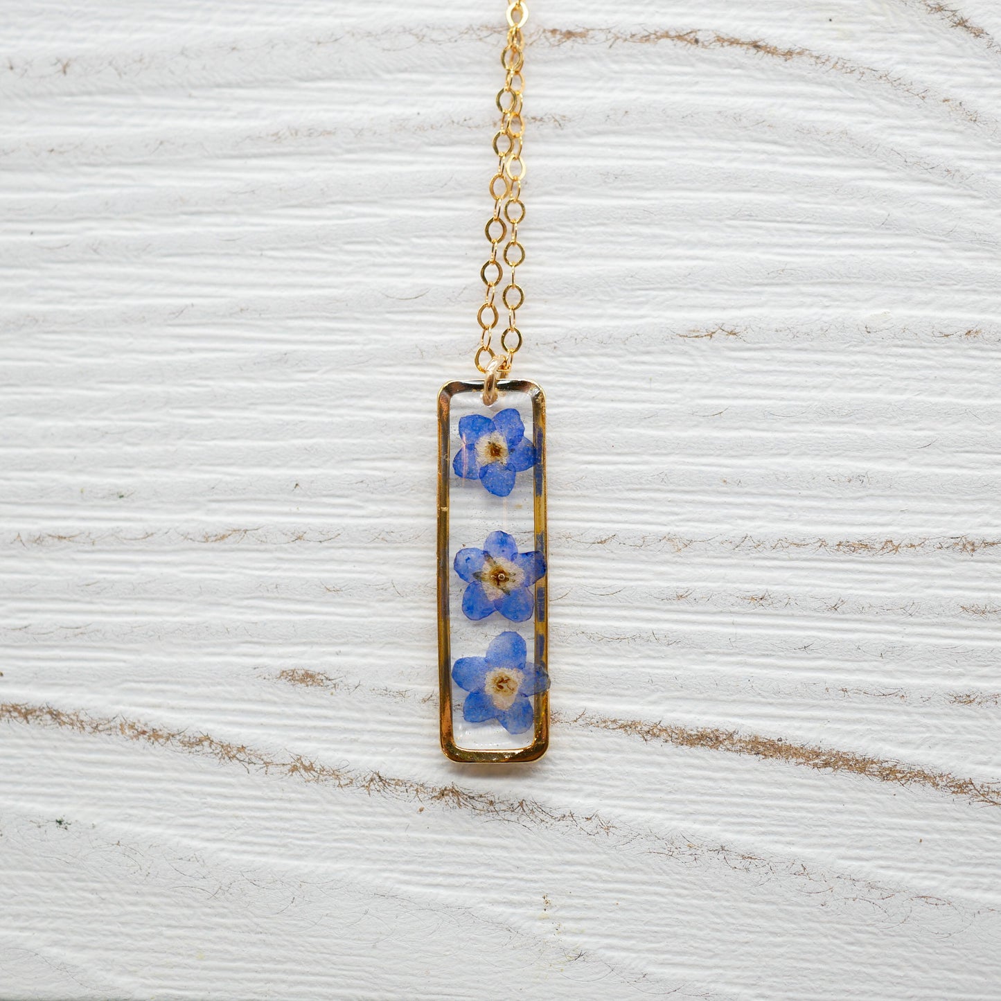 Load image into Gallery viewer, Forget me not vertical bar necklace

