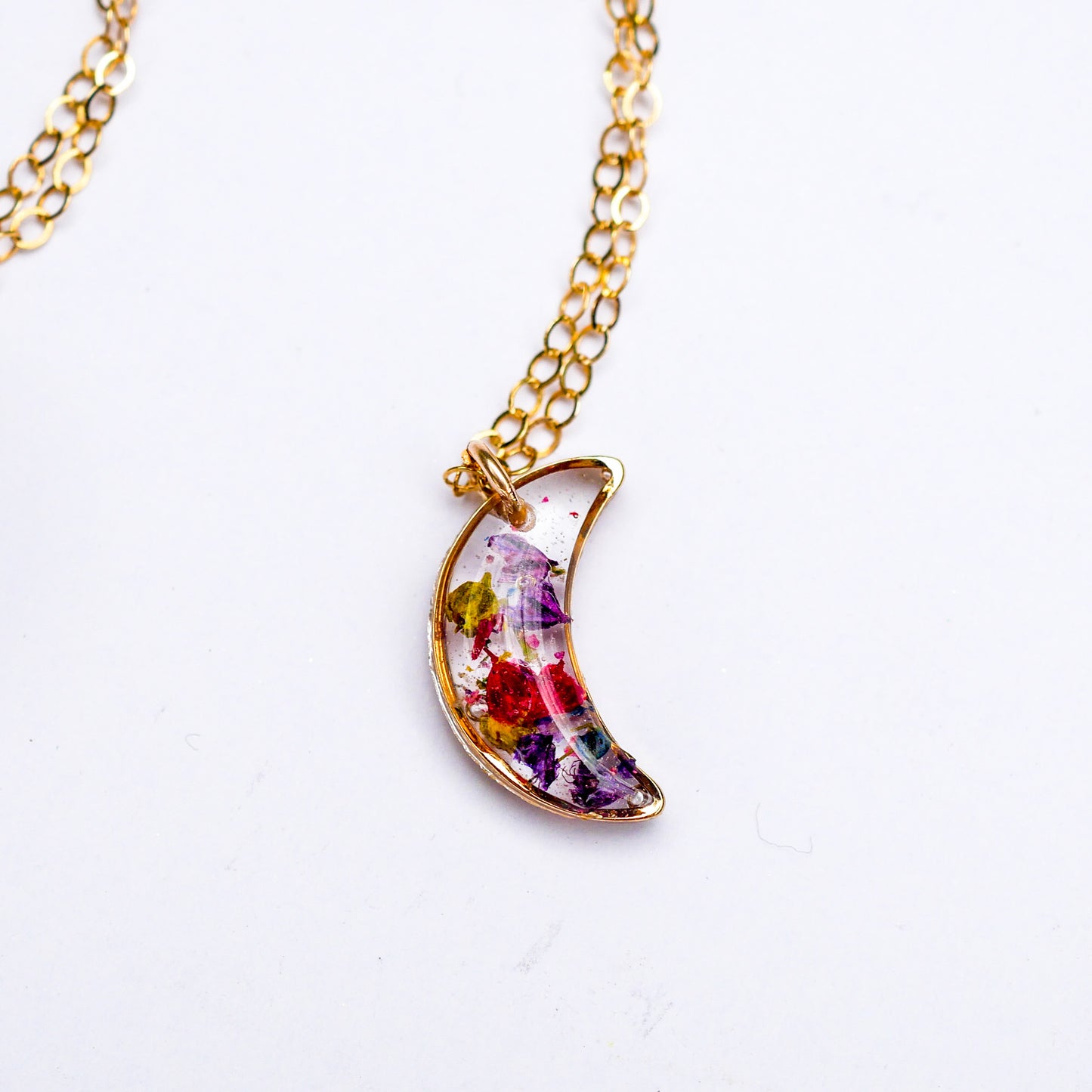 Load image into Gallery viewer, Tiny Pressed Flowers crescent moon necklace
