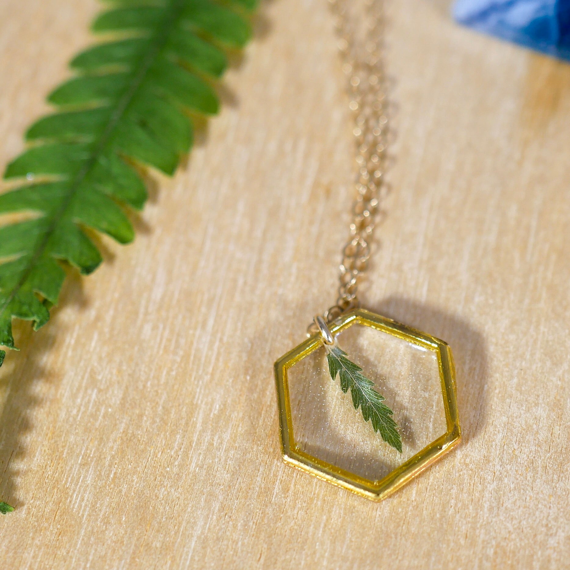 Tiny gold hexagon fern